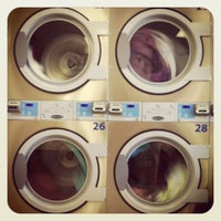 Photo taken at Gatorland Laundromat by Holly G. on 7/18/2012