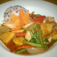 Photo taken at Red Jasmine Thai Cuisine by Molly S. on 1/27/2012