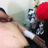 Photo taken at Dharma Tattoo by Thiago R. on 8/1/2012