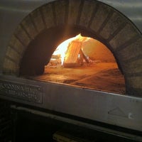 Photo taken at Pizzeria Vesuvius by Kip N. on 4/25/2011