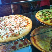 Photo taken at Rosario&amp;#39;s Pizzeria by Margarita J. on 10/19/2011