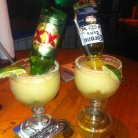 Photo taken at Ojos Locos Sports Cantina by Lucerito N. on 5/3/2012