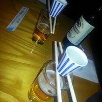 Photo taken at Toshi Sushi by dana k. on 9/1/2012