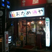 Photo taken at おため酒や by ymkx on 7/13/2012