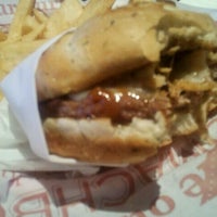 Photo taken at Red Robin Gourmet Burgers and Brews by Trent S. on 5/9/2012