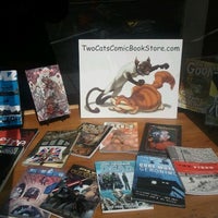 Photo taken at Two Cats Comic Book Store by JC M. on 4/8/2012
