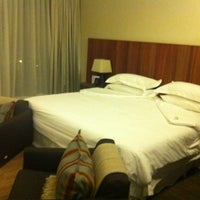 Photo taken at Hotel Enjoy by Sebastian B. on 3/31/2012
