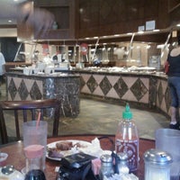 Photo taken at Golden Island Chinese Buffet by Susan C. on 5/3/2012