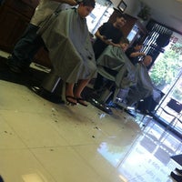 Photo taken at Manny&amp;#39;s Barber Shop by Mysterio W. on 5/6/2012