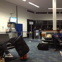 Photo taken at Gate 34 by Andrew B. on 12/26/2012