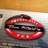 Photo taken at Tom Reid&amp;#39;s Hockey City Pub by Brad K. on 5/9/2013