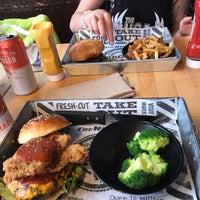 Photo taken at The Works Gourmet Burger Bistro by Becca on 7/2/2019