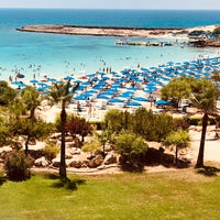 Photo taken at Asterias Beach Hotel by Charis T. on 7/23/2020