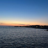 Photo taken at Pontile di Ostia by Matteo D. on 5/16/2022