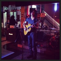 Photo taken at Woodstock Bar &amp;amp; Grill by Jarinee L. on 2/22/2013