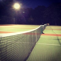 Photo taken at Crotona Park tennis courts by Helly K. on 8/6/2014