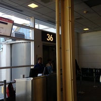 Photo taken at Gate D36 by Christopher G. on 1/20/2013