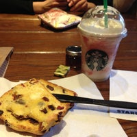 Photo taken at Starbucks by Manuela M. on 5/11/2013