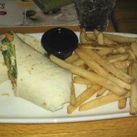 Photo taken at Applebee&amp;#39;s Grill + Bar by Cris D. on 11/8/2012