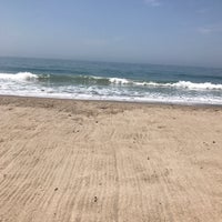 Photo taken at Carbon Beach by Monti B. on 7/7/2018