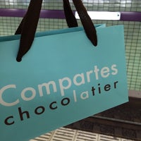 Photo taken at Compartes chocolatier by HATSUMI on 9/29/2014