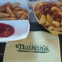Photo taken at Nathan&amp;#39;s Famous by crystal h. on 6/29/2013