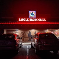 Foto diambil di Saddle Bronc Grill oleh Shubi C. pada 3/7/2021