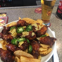 Photo taken at Red Robin Gourmet Burgers and Brews by Michael T. on 4/17/2018