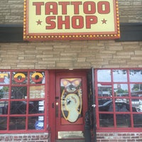 Photo taken at Trader Bob&amp;#39;s Tattoo Shop by Bay Bay Q. on 5/30/2017