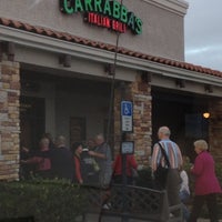 Photo taken at Carrabba&amp;#39;s Italian Grill by Joy G. on 12/14/2012