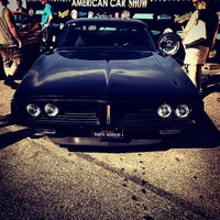 Photo taken at muscle car show by Alexander S. on 7/13/2014