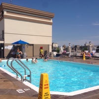 Photo taken at Holiday Inn Rooftop Pool by Alex O. on 8/15/2015