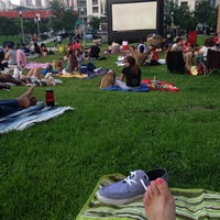 Photo taken at Fulton River District- Movies In The Park by Conor M. on 7/22/2014