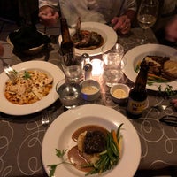 Photo taken at Bravos Restaurant Bar by Patrick O. on 3/11/2018