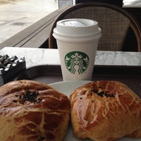 Photo taken at Starbucks by Emrah S. on 5/10/2013
