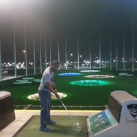 Photo taken at top golf by Tyler L. on 6/10/2014