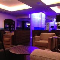 Photo taken at British Airways - International Lounge by Ilya P. on 2/24/2012