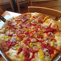 Photo taken at Strong&amp;#39;s Brick Oven Pizzeria by Rusty L. on 10/24/2012