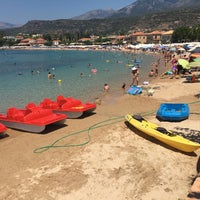 Photo taken at Stoupa Beach by TO F. on 8/9/2019