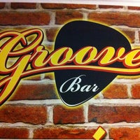 Photo taken at Groove Bar by Fábio B. on 12/8/2012