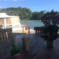 Foto diambil di Canoa Bar &amp;amp; Bistro Beira Rio - Barra do Una oleh Nicole F. pada 4/21/2016