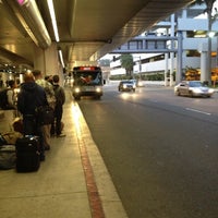 Photo taken at Rental Car Shuttle Waiting Area by Jeff P. on 12/10/2012