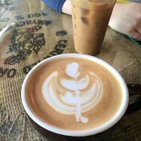 Photo taken at Just Love Coffee Roasters by Amanda L. on 6/30/2018