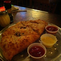 Photo taken at Mogio&amp;#39;s Gourmet Pizza by Anya M. on 11/21/2012