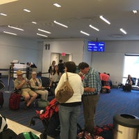 Photo taken at Gate 11 by Henry W. on 7/16/2016