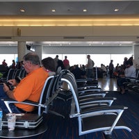 Photo taken at Gate 21 by Henry W. on 7/16/2016