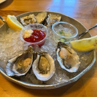 Photo taken at EMC Seafood &amp;amp; Raw Bar by Thomas P. on 6/21/2022