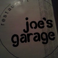 Photo taken at Joe&#39;s Garage by Sydney K. on 11/26/2012