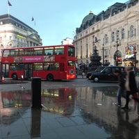 Photo taken at Piccadilly Circus by Favio A. on 5/11/2013