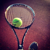 Photo taken at Banneker Tennis Courts by Ashley E. on 3/15/2014